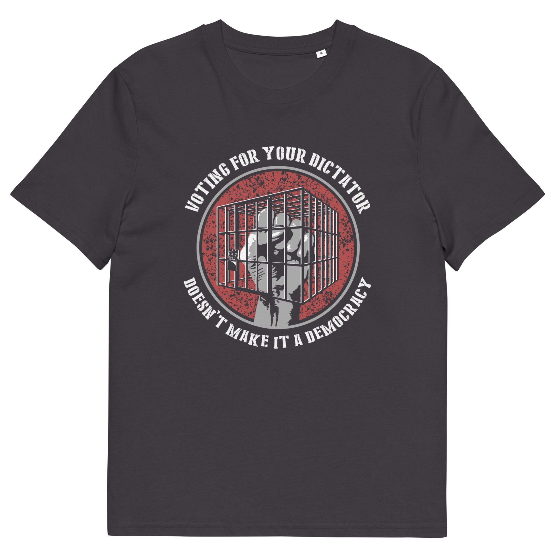 An anthracite short-sleeve t-shirt with a circular graphic on the chest. The graphic features a red distressed background with a white silhouette of a person behind bars, surrounded by the text 'VOTING FOR YOUR DICTATOR' on top and 'DON'T MAKE IT A DEMOCRACY' on the bottom.