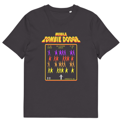 An anthracite grey t-shirt featuring a retro video game style graphic on the chest. The graphic displays the text 'MOBILE ZOMBIE DODGE' in a yellow-orange gradient font above a grid of dancing zombie figures in purple, red, and yellow, mimicking a classic arcade game menu.