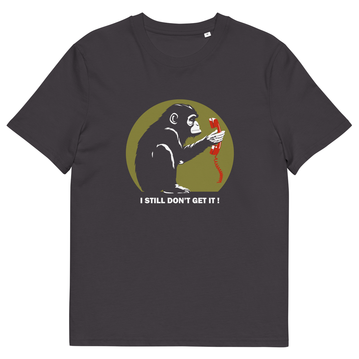 An anthracite grey t-shirt with a design of a monkey staring at an old style telephone receiver with text underneath saying "I STILL DON'T GET IT".