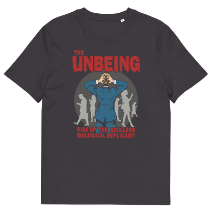 An anthracite grey short sleeved crew neck t-shirt with a pop art graphic of a man with his hands on his head while looking at a group of people engrossed with their smartphones. Above is the text "THE UNBEING" and underneath is the text "RISE OF THE SOULLESS BIOLOGICAL REPLICANT".