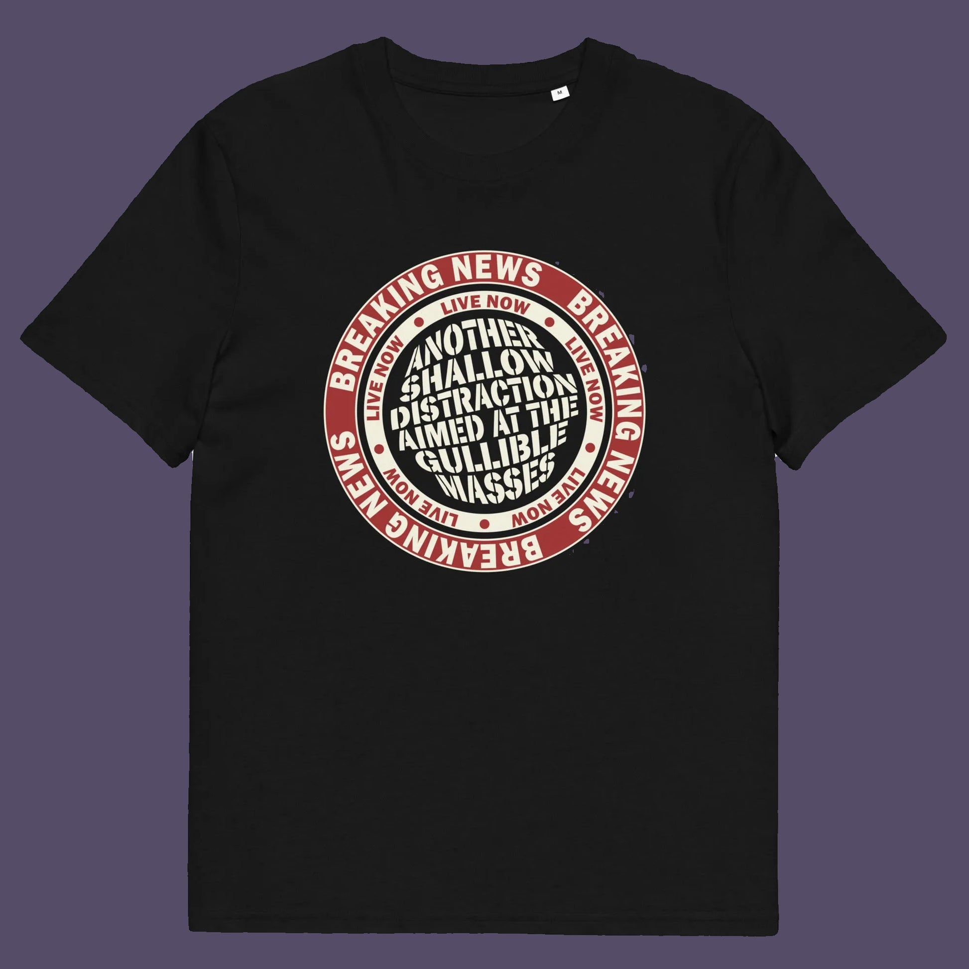 Black t shirt. An anti media, non conformist t shirt. This design suggests that the media is being used to keep us distracted from the real issues taking place around us. Don't fall for the new bright flashing lights! Made from 100% organic ring-spun cotton, this social awareness t shirt is unisex, high-quality, super comfy, and best of all, eco-friendly.