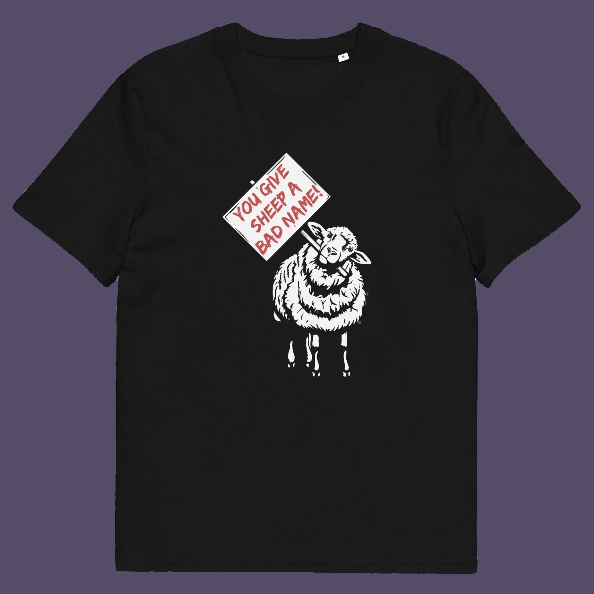 Black t shirt.  This anti establishment t shirt twists the human 'sheep' metaphor back in the favour of the sheep. Using the expression 'Sheep' may be more offensive than we think. Made from 100% organic ring-spun cotton, this anti establishment t shirt is unisex, high-quality, super comfy, and best of all, eco-friendly.
