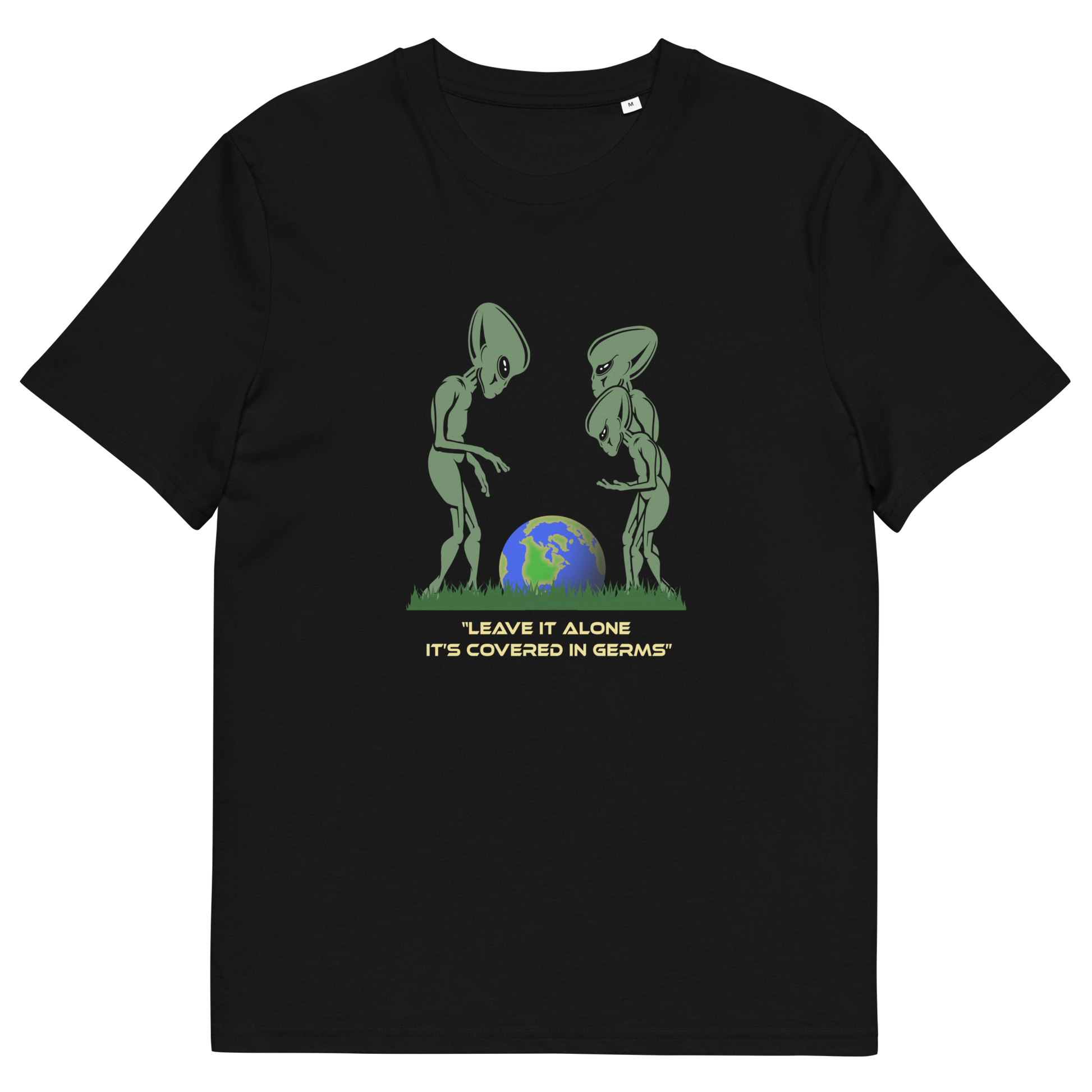 A black short-sleeve crewneck t-shirt featuring a graphic of two green aliens looking at a blue and green globe, with the text 'LEAVE IT ALONE IT'S COVERED IN GERMS' printed below in yellow.