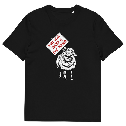 A black short-sleeve crewneck t-shirt featuring a graphic print of a white sheep holding a red and white sign that reads 'YOU GIVE SHEEP A BAD NAME!'.