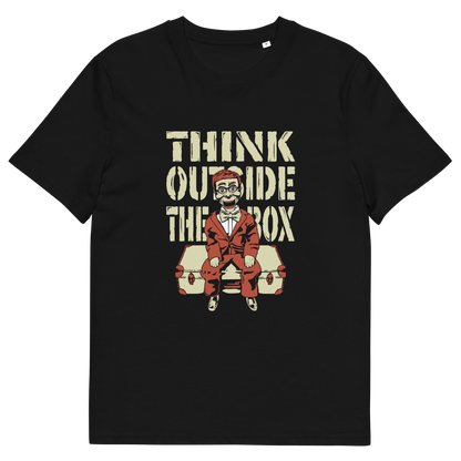 A black short-sleeve crewneck t-shirt featuring a graphic print on the front. The graphic displays the text 'THINK OUTSIDE THE BOX' in a distressed beige font above an illustration of a ventriloquist dummy.