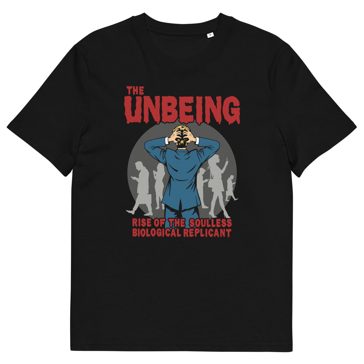 A black short sleeved crew neck t-shirt with a pop art graphic of a man with his hands on his head while looking at a group of people engrossed with their smartphones. Above is the text "THE UNBEING" and underneath is the text "RISE OF THE SOULLESS BIOLOGICAL REPLICANT".