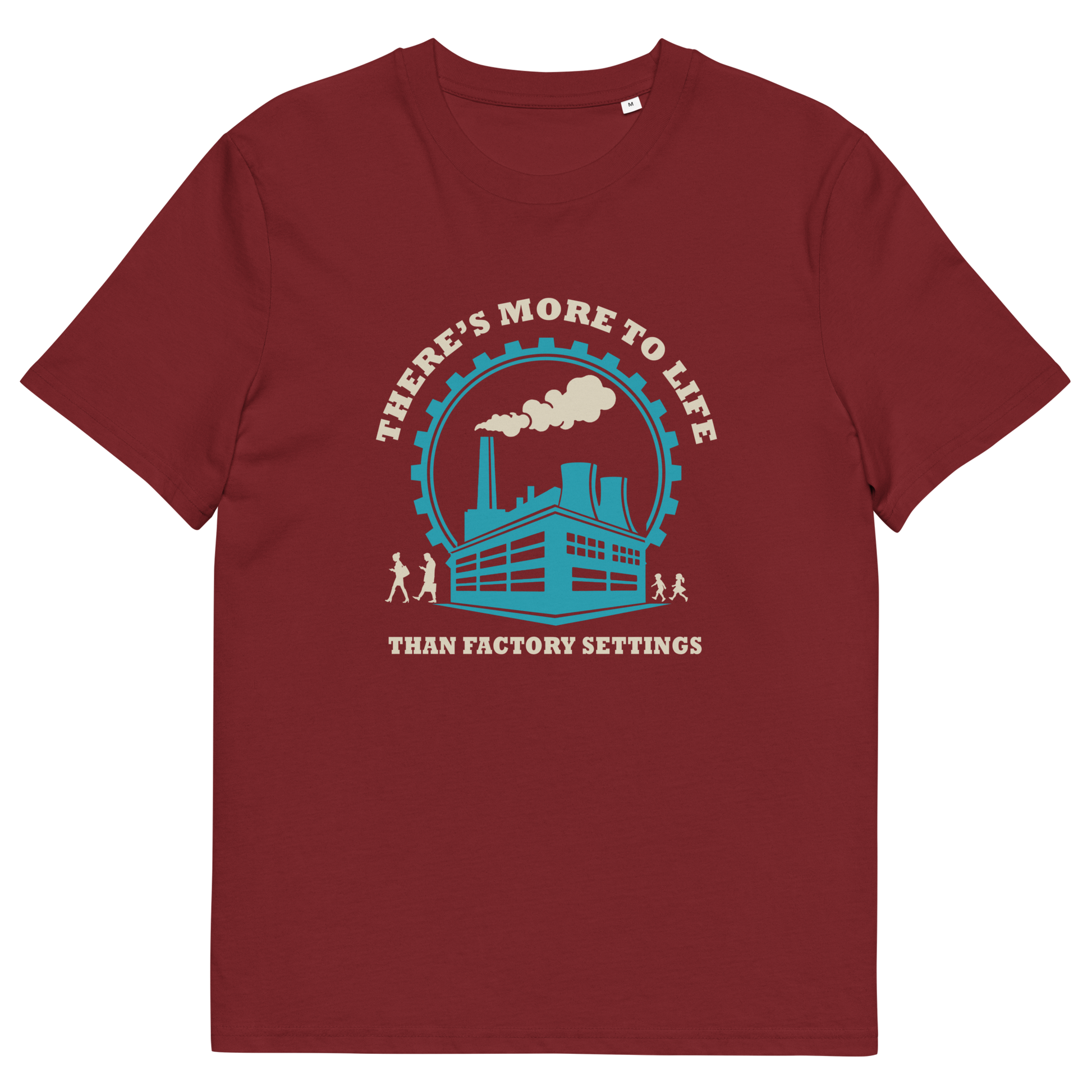 A burgundy short-sleeve crewneck t-shirt with a graphic print on the front. The graphic features a light blue and cream illustration of a factory with smokestacks, surrounded by the text 'THERE'S MORE TO LIFE THAN FACTORY SETTINGS'.