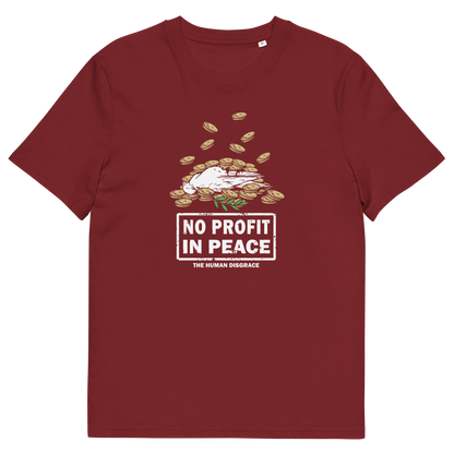 A maroon short-sleeve crewneck t-shirt featuring a graphic print of a white dog lying on a pile of gold coins with the text 'NO PROFIT IN PEACE' and 'THE HUMAN DISGRACE' underneath.