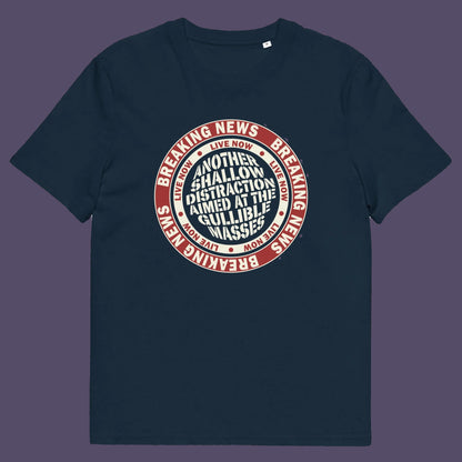 French navy t shirt. An anti media, non conformist t shirt. This design suggests that the media is being used to keep us distracted from the real issues taking place around us. Don't fall for the new bright flashing lights! Made from 100% organic ring-spun cotton, this social awareness t shirt is unisex, high-quality, super comfy, and best of all, eco-friendly.