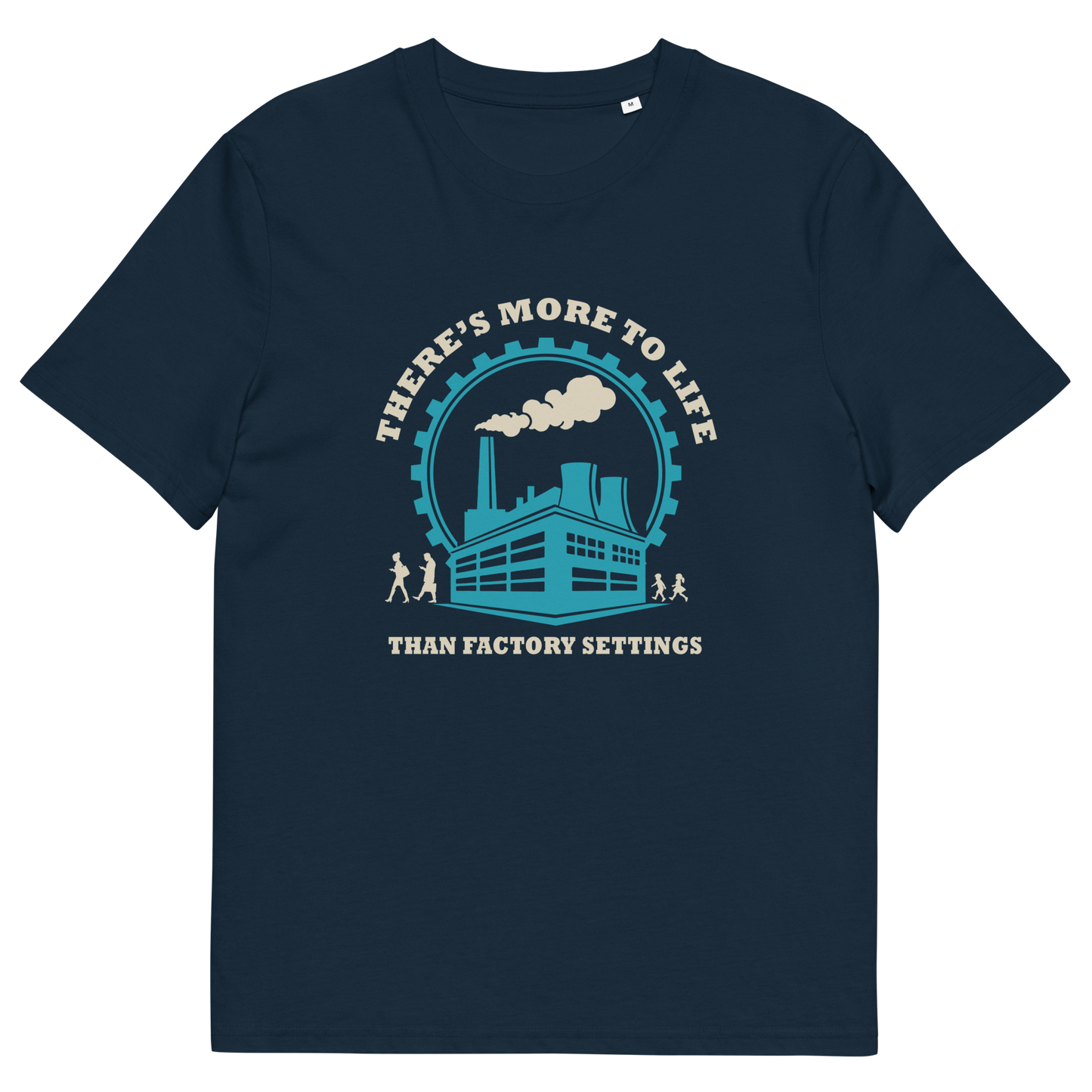 A French navy blue short-sleeve crewneck t-shirt with a graphic print on the front. The graphic features a light blue and cream illustration of an industrial factory building under a circular gear and the text 'THERE'S MORE TO LIFE THAN FACTORY SETTINGS'.