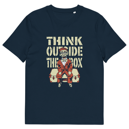 A French navy blue short-sleeve  t-shirt featuring a graphic print on the front. The graphic displays the text 'THINK OUTSIDE THE BOX' in a distressed beige font above an illustration of a ventriloquist dummy.