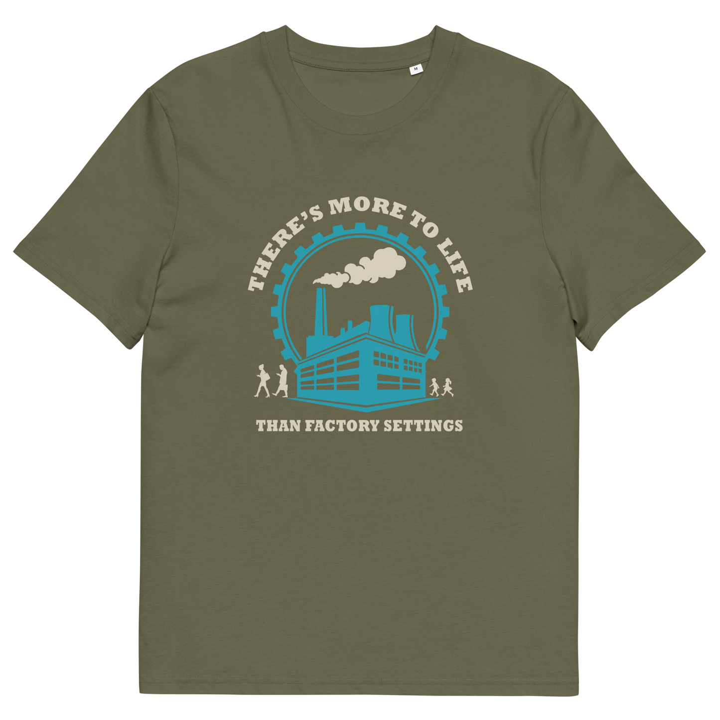 An khaki short-sleeve t-shirt with a graphic print on the front. The graphic features a light blue and cream illustration of a factory with smokestacks, surrounded by the text 'THERE'S MORE TO LIFE THAN FACTORY SETTINGS'.