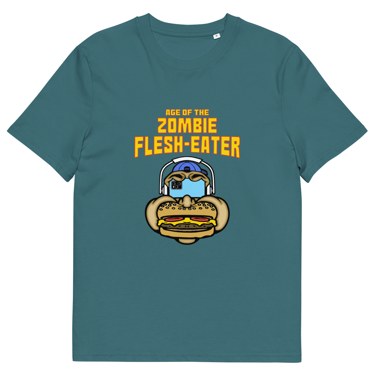 Stargazer blue t-shirt with a graphic on the front. The graphic features the text 'AGE OF THE ZOMBIE FLESH-EATER' in yellow, above a cartoon zombie head wearing headphones and biting a burger.