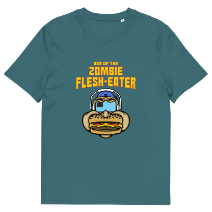 Stargazer blue t-shirt with a graphic on the front. The graphic features the text 'AGE OF THE ZOMBIE FLESH-EATER' in yellow, above a cartoon zombie head wearing headphones and biting a burger.