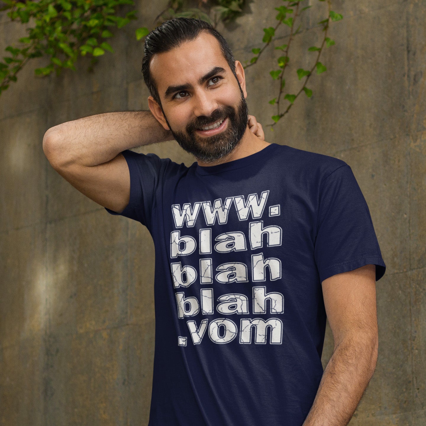 Man wearing a French navy blue t-shirt with text, standing against a concrete wall with greenery. A non conformist t shirt for those who are bored and sickened by how much of their world exists through the internet nowadays. Show how unimpressed you are with this nonconformist t-shirt design. Made from 100% organic ring-spun cotton, this social awareness t shirt is unisex, high-quality, super comfy, and best of all, eco-friendly.