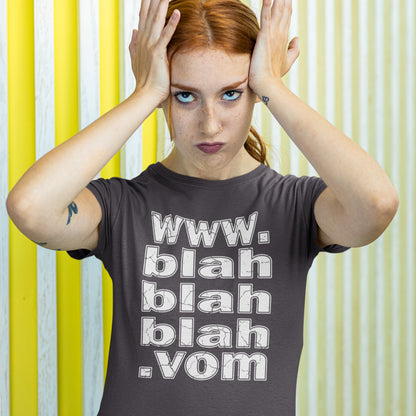 Woman wearing a t-shirt with 'www. blah blah blah. vom' text against a yellow and white striped background. A non conformist t shirt for those who are bored and sickened by how much of their world exists through the internet nowadays. Show how unimpressed you are with this nonconformist t-shirt design. Made from 100% organic ring-spun cotton, this social awareness t shirt is unisex, high-quality, super comfy, and best of all, eco-friendly.