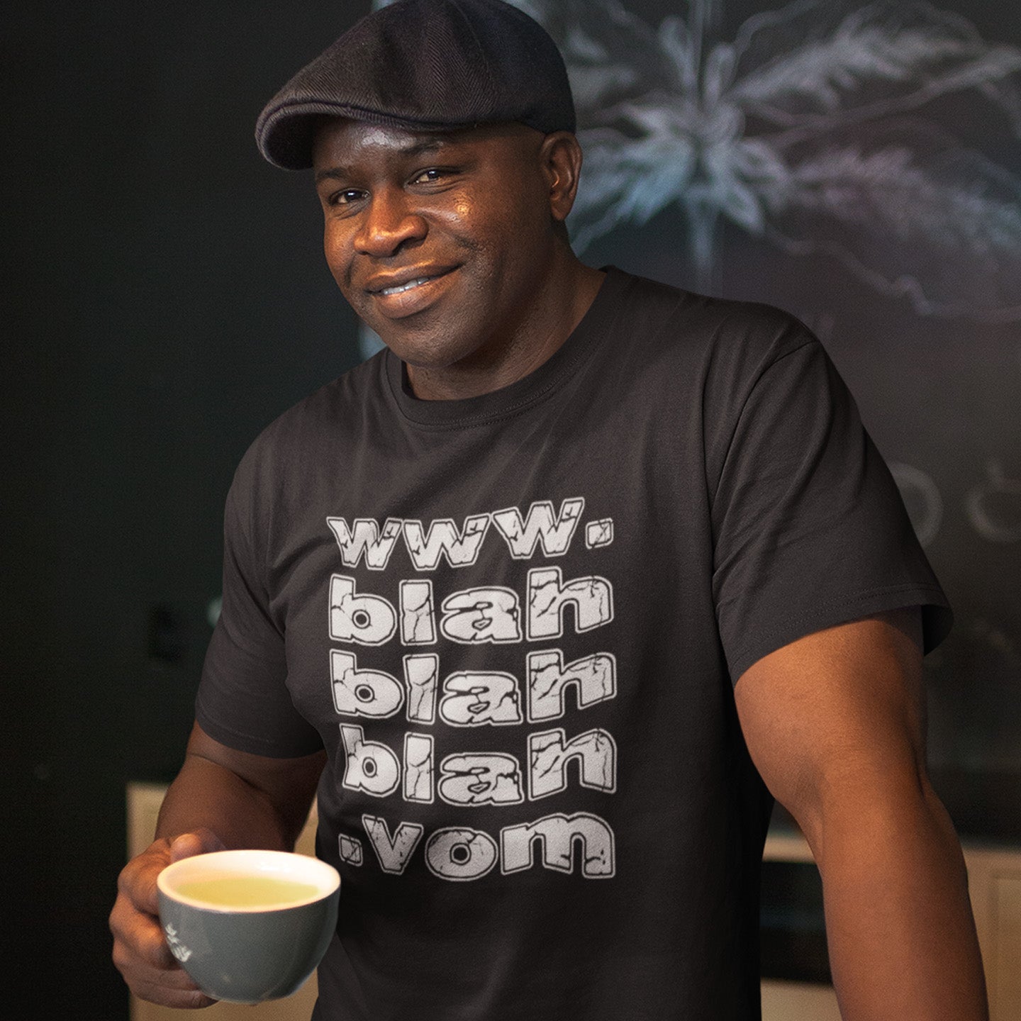 Man wearing a black t-shirt with text holding a mug, against a dark background. A non conformist t shirt for those who are bored and sickened by how much of their world exists through the internet nowadays. Show how unimpressed you are with this nonconformist t-shirt design. Made from 100% organic ring-spun cotton, this social awareness t shirt is unisex, high-quality, super comfy, and best of all, eco-friendly.