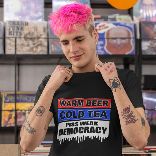 Warm beer, cold tea, piss weak democracy. These are the things no one wants served to them !!  Made from 100% organic ring-spun cotton, this unisex t-shirt is a total must-have. It's high-quality, super comfy, and best of all—eco-friendly.